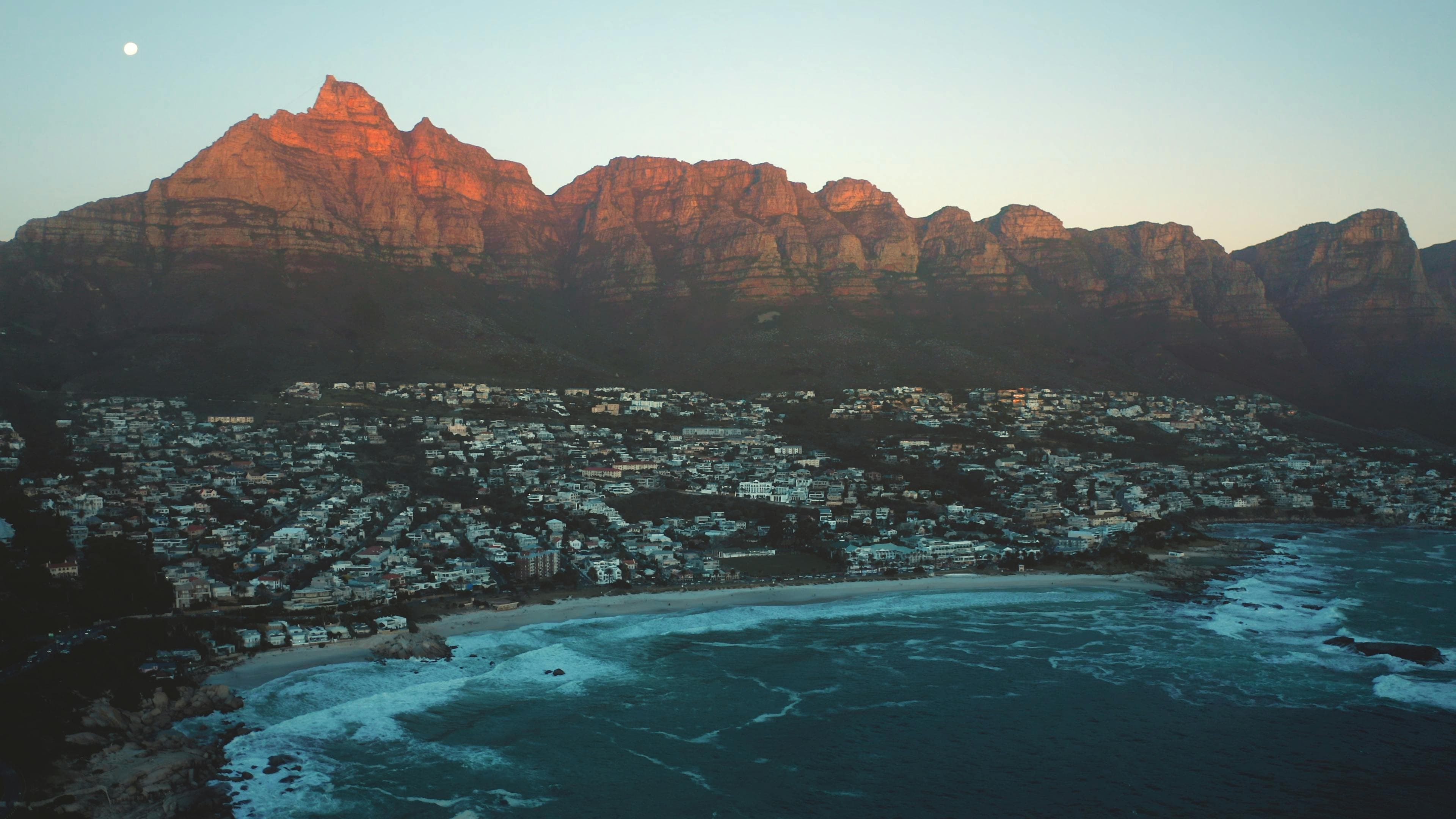 A panoramic view of Cape Town city with Table Mountain in the background.